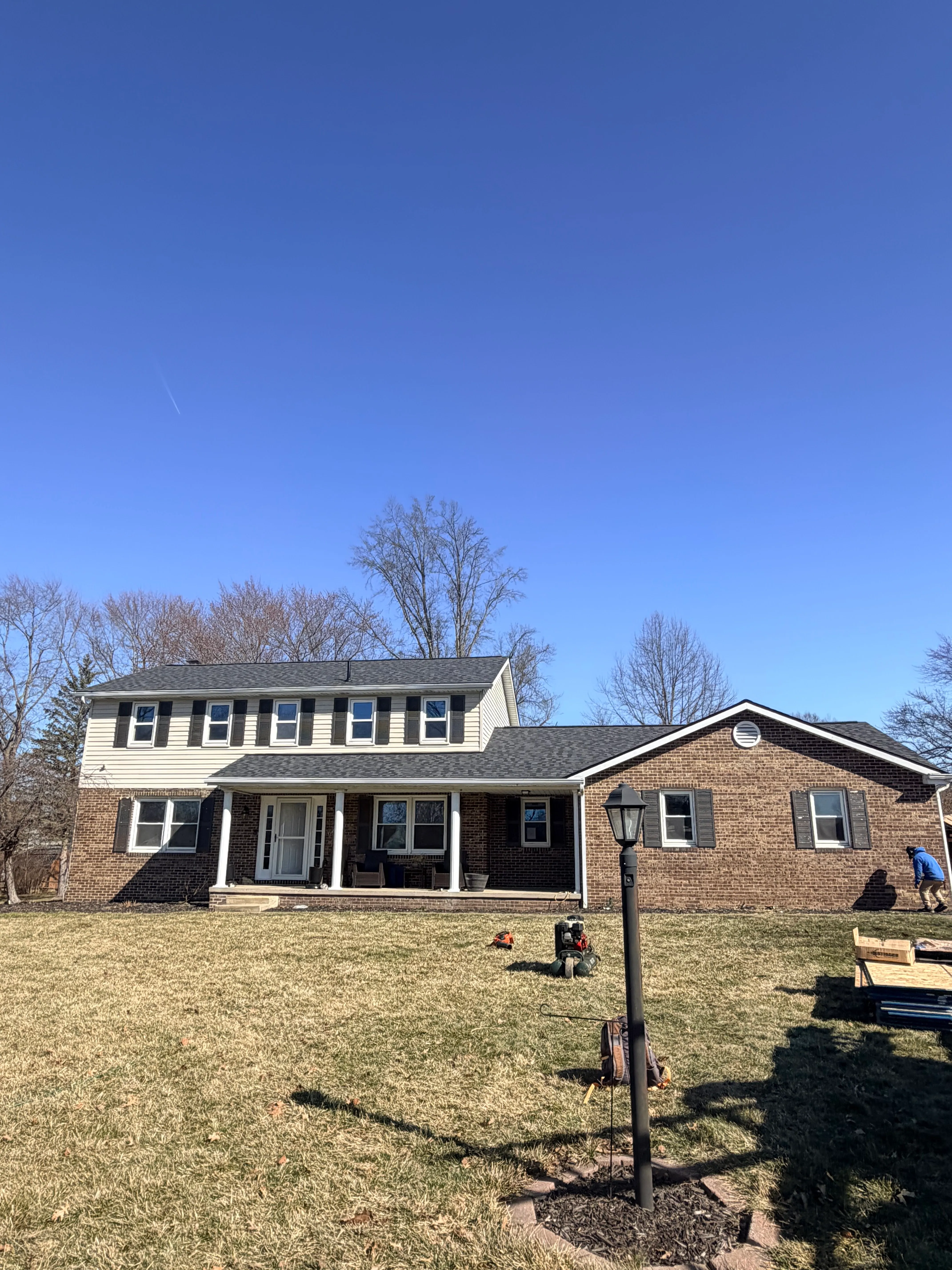 HOF Roofing crew installing a new architectural shingle roof on a home in Ohio